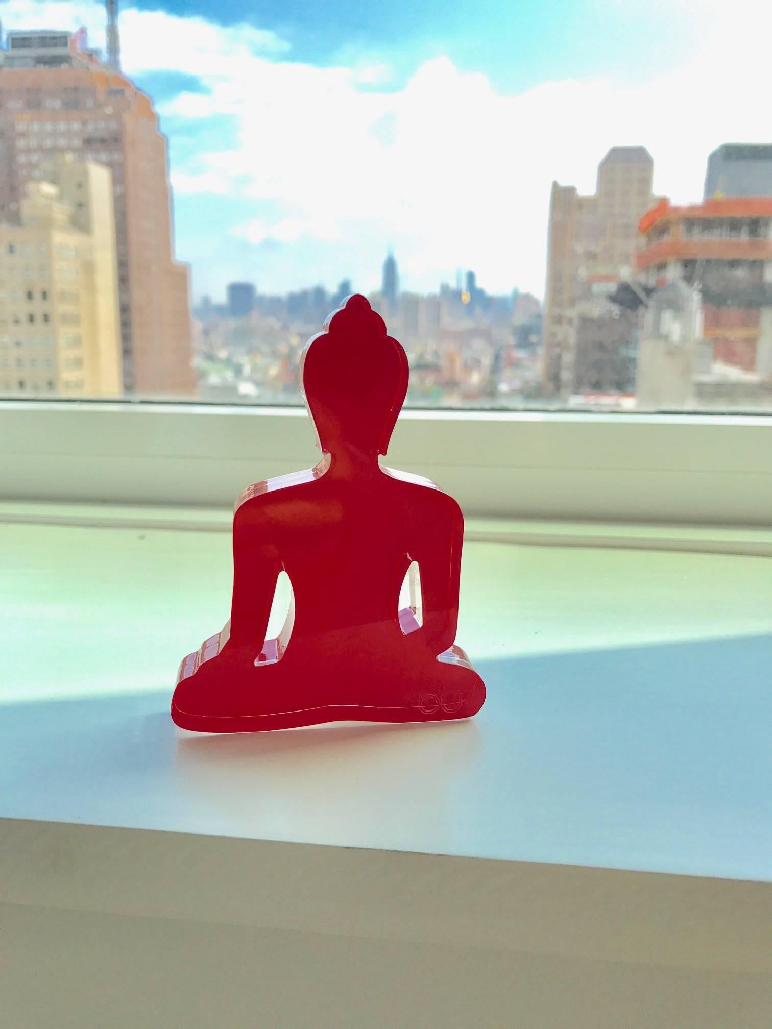 These colorful meditating Buddha silhouette statues are laser cut Plexiglas and acrylic hand painted.
The mini Buddha statues are designed as an everyday reminder to live a compassionate and mindful life. 
The statues are a contemporary design,