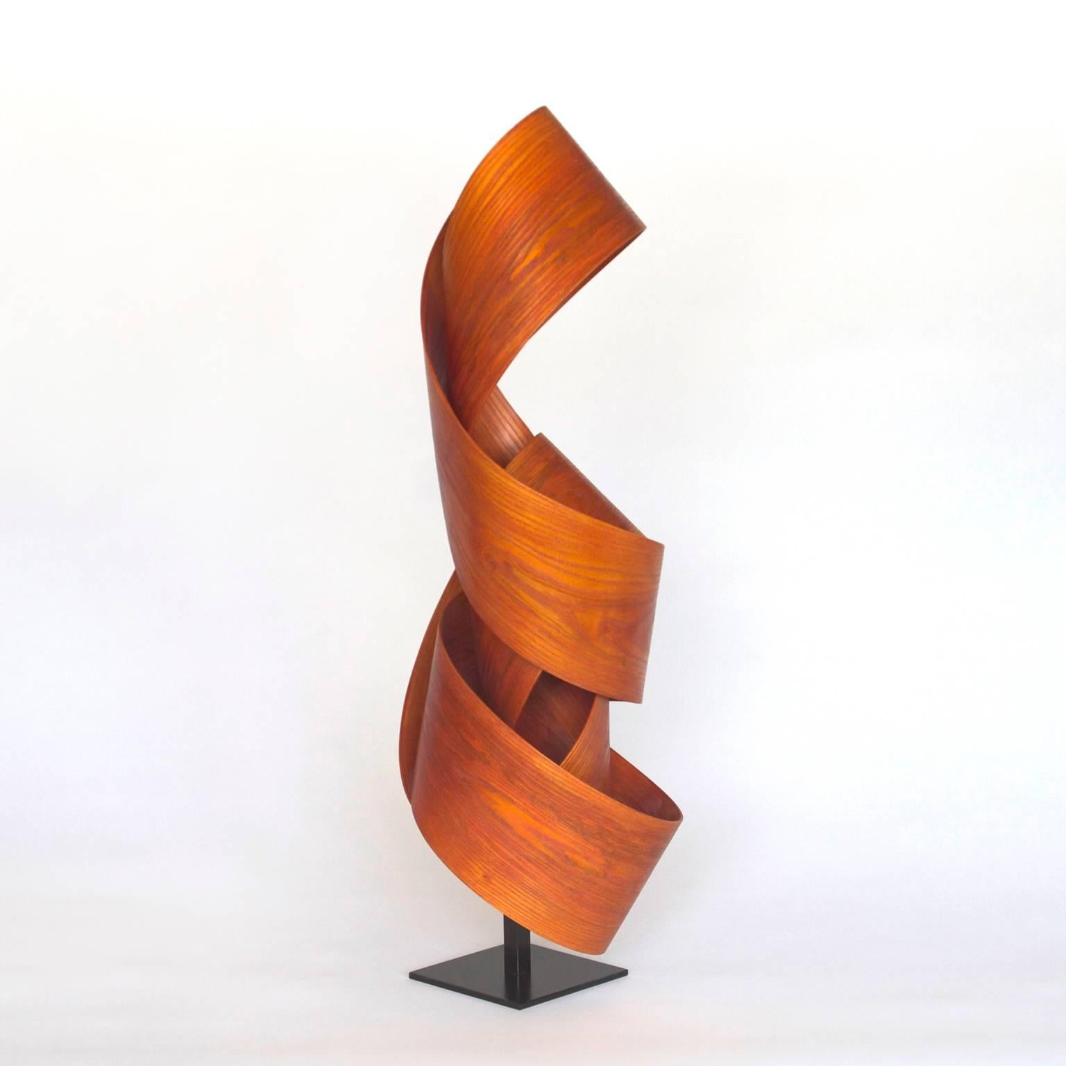 Jeremy Holmes creates lyrical wood sculptures and installations that respond to and celebrate the spaces they occupy. His works range in size from free standing sculptures that are a few feet high to gravity defying installations rendered in wood