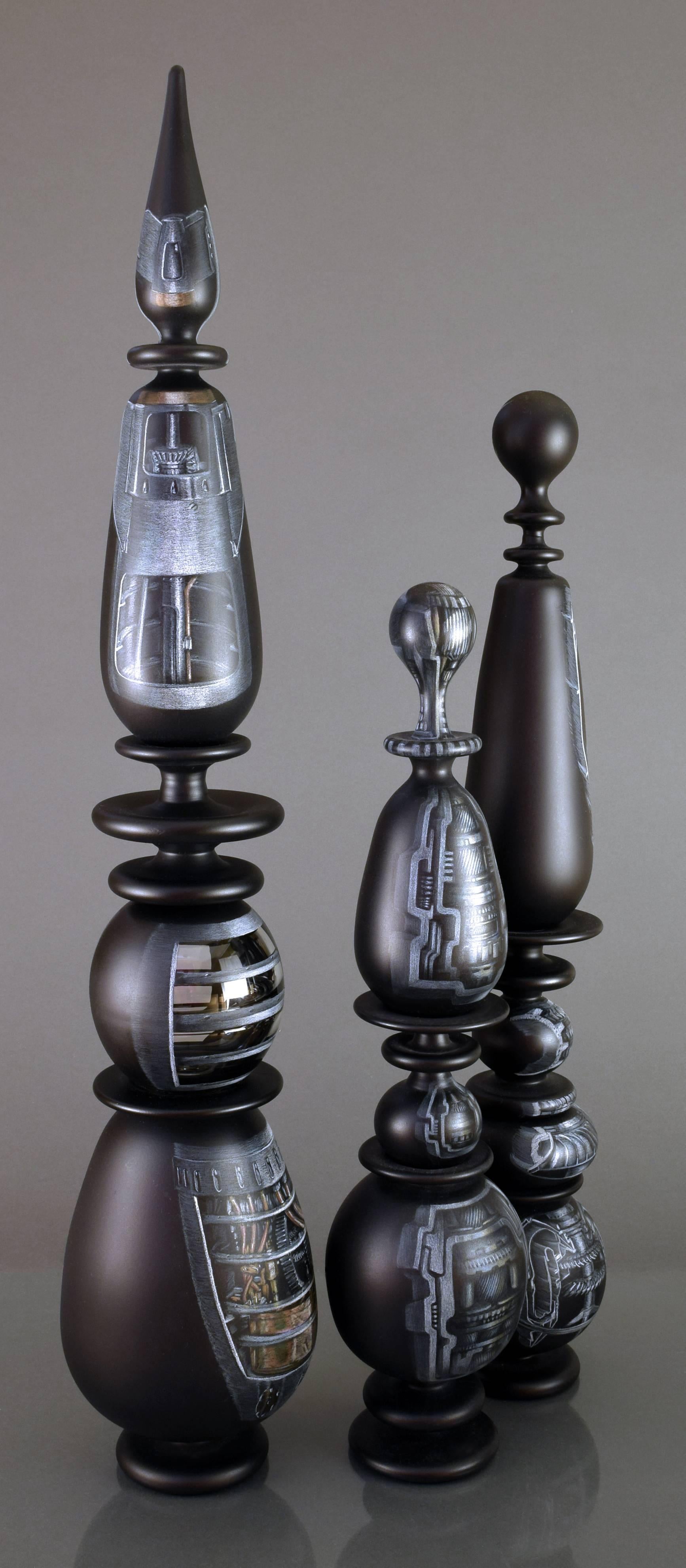 This set of three objects is by Steven Ciezki. 