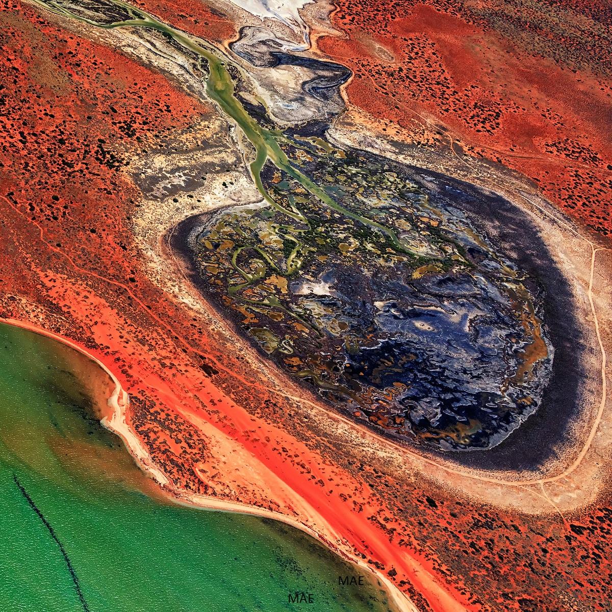 This is a new series of photography of land art depicting Earth and its land forms taken from the air. This series of aerial photography captures Earth's beauty in its natural, diverse and vibrant colors at world heritage preservation sites around