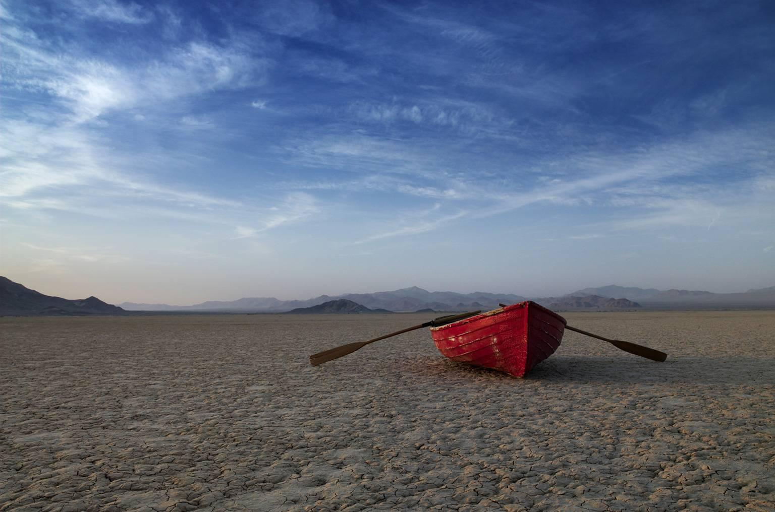 On Land - large format photograph of iconic wooden row boat on desert lake bed