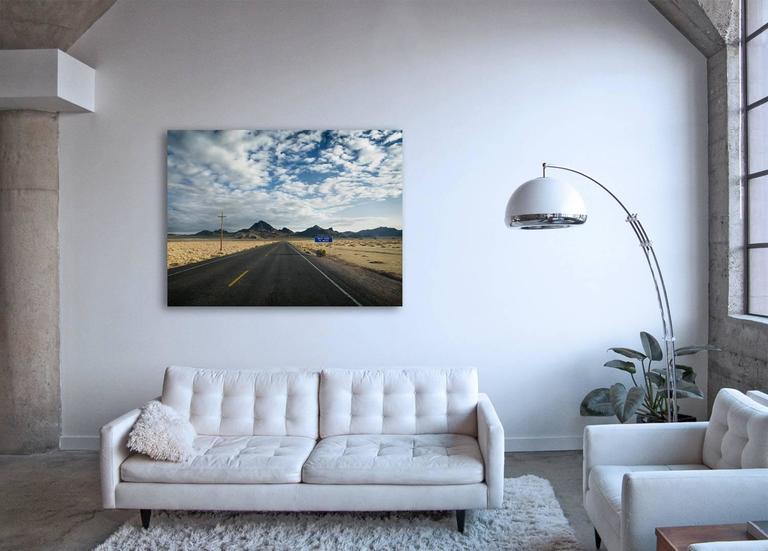 Next Sign - large format landscape photograph with conceptual road sign - Photograph by Frank Schott