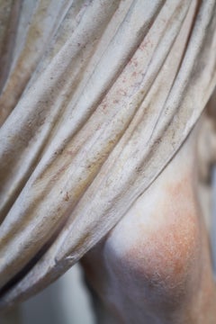 Cesare - photograph of cascading fashion details of antique sculpture