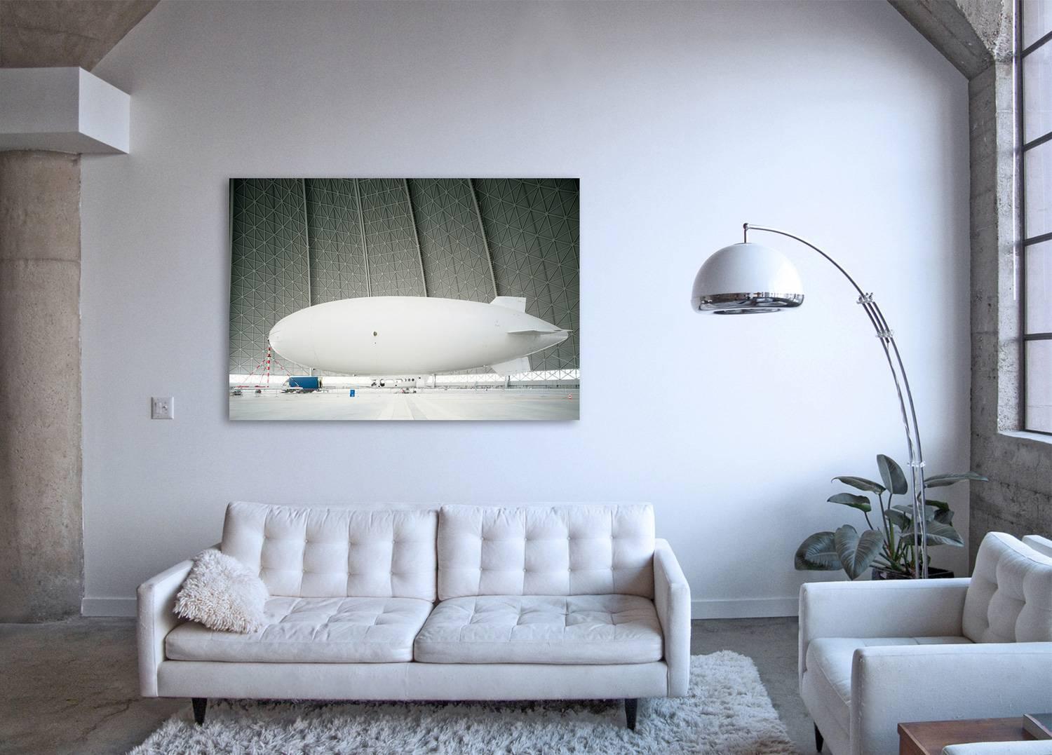 Zeppelin (framed) - monumental photograph of iconic pioneering airship in hangar - Photograph by Christian Stoll