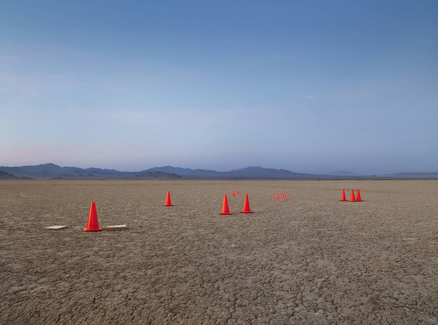 Cones - large scale photograph of conceptual art in desert landscape