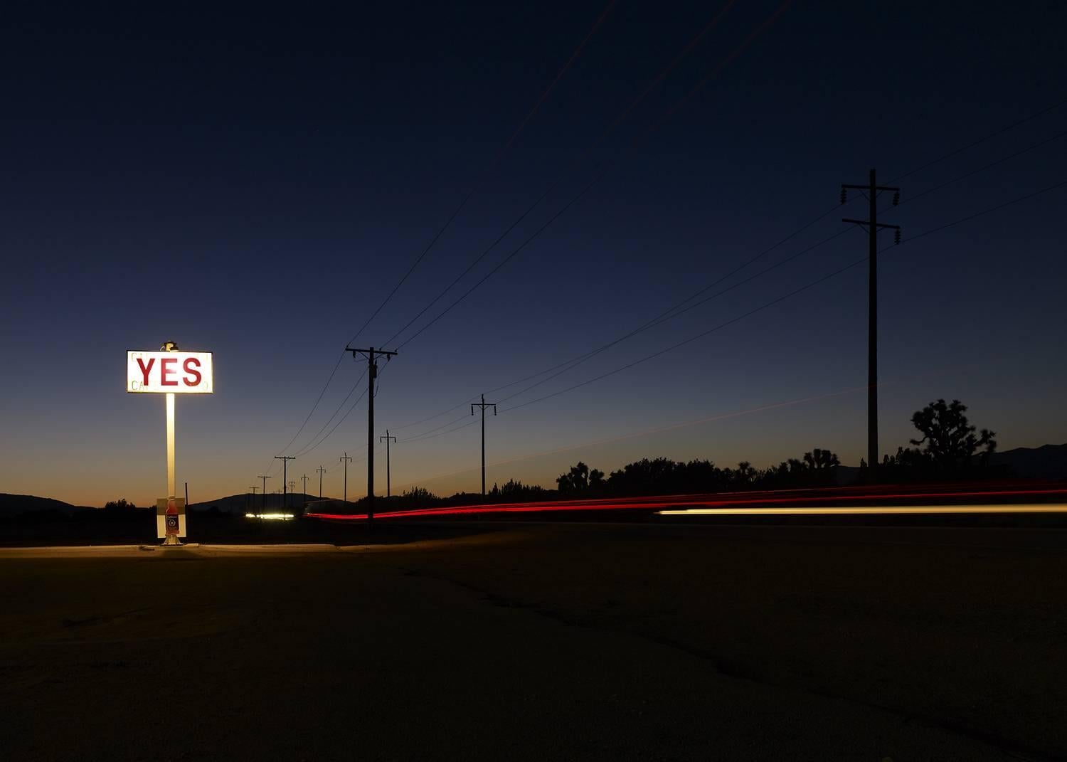 Frank Schott Landscape Print - YES - large format photograph of conceptual motivational sign at night