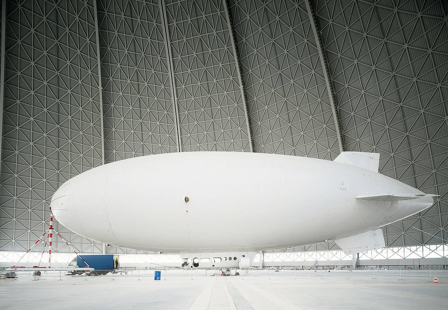 Christian Stoll Color Photograph - Zeppelin - large format photograph of iconic white airship