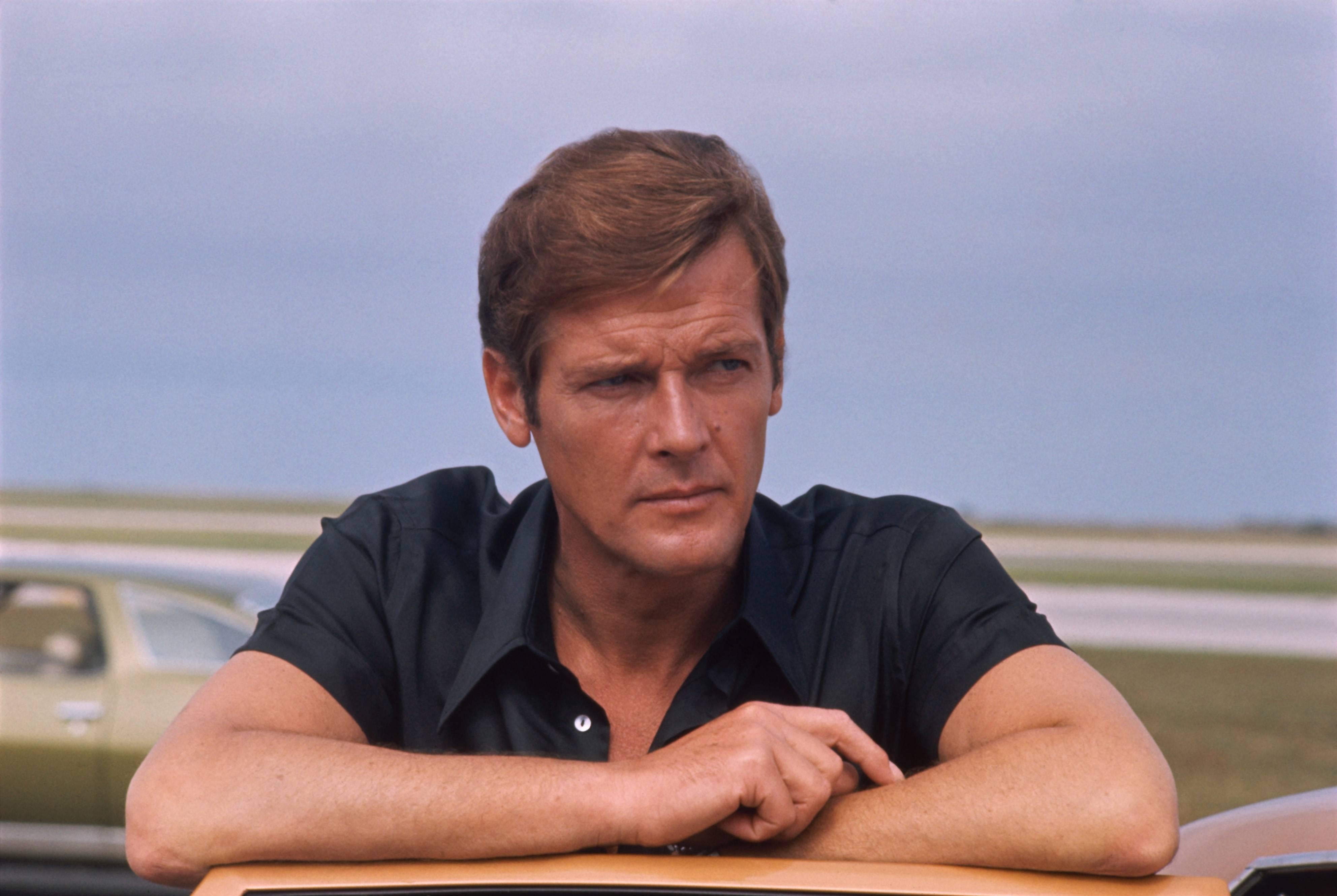 Terry O'Neill Portrait Photograph - Roger Moore - 1973