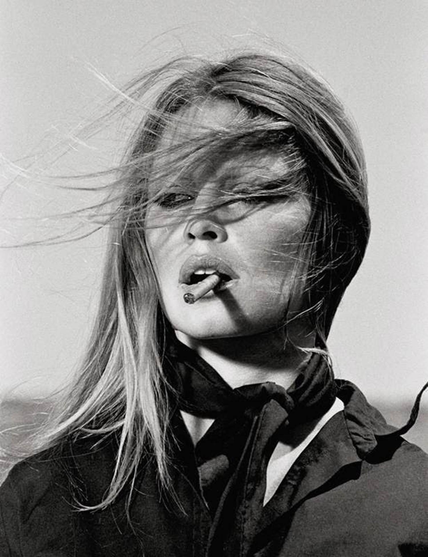 Terry O'Neill Portrait Photograph - Brigitte Bardot Cigar, 1971, Hand Signed