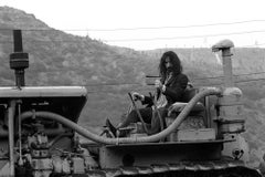 Frank Zappa on tractor B&W