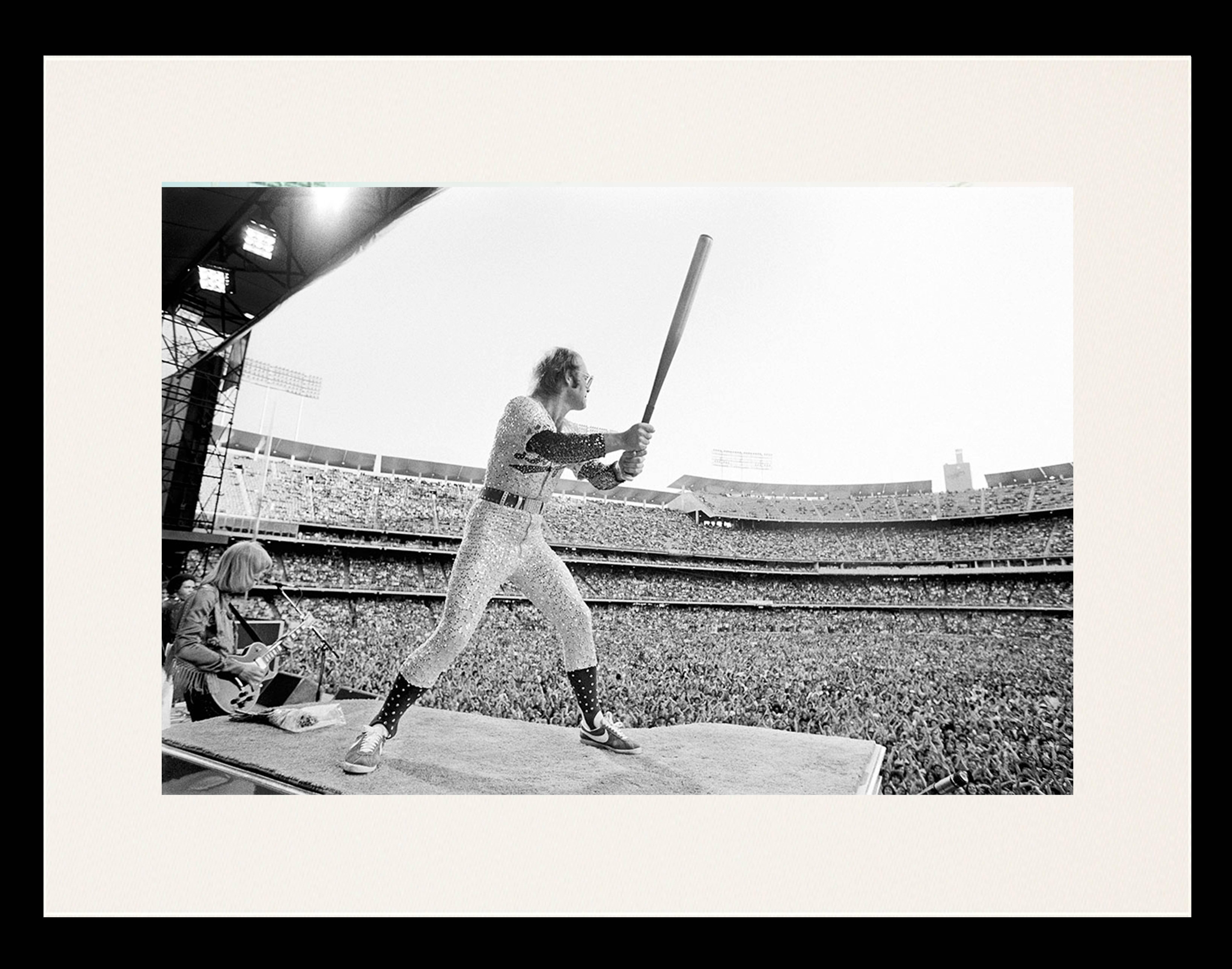 Terry O'Neill Black and White Photograph - Elton John Dodgers Stadium, Batting (Framed)