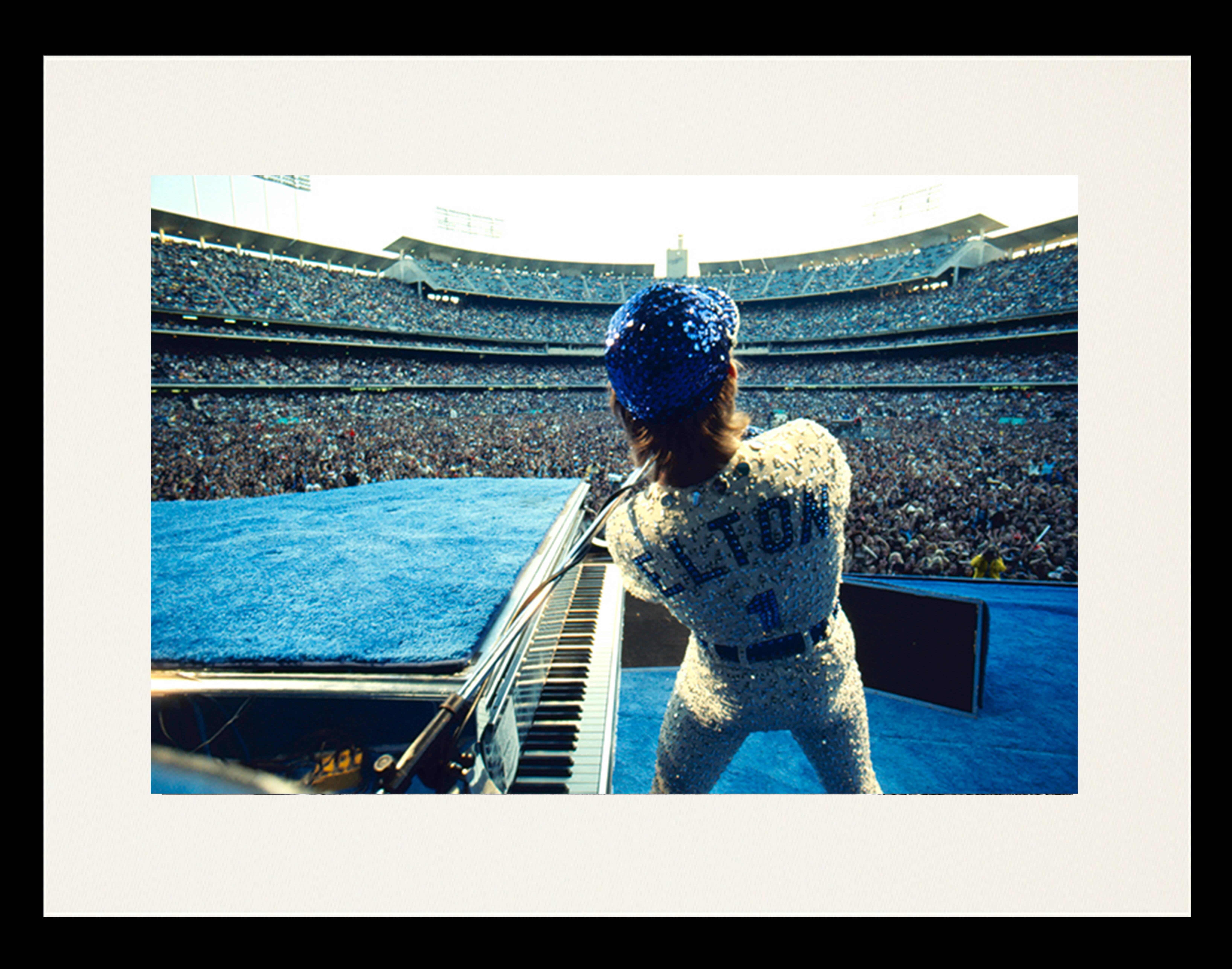 Terry O'Neill Color Photograph - Elton John Dodgers Stadium, Back View (Framed)