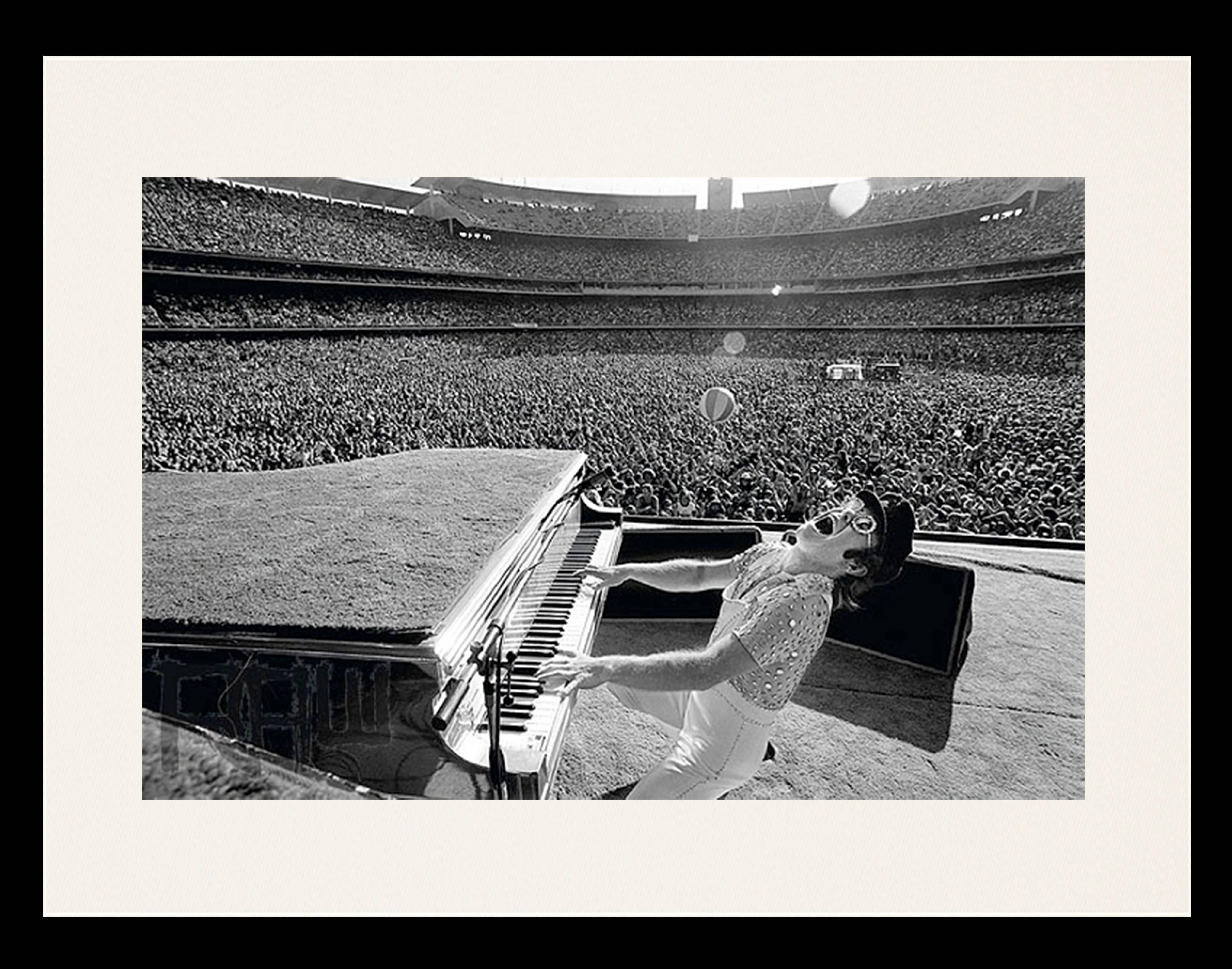 Terry O'Neill Black and White Photograph - Elton John Dodgers Stadium, Howling (1975)