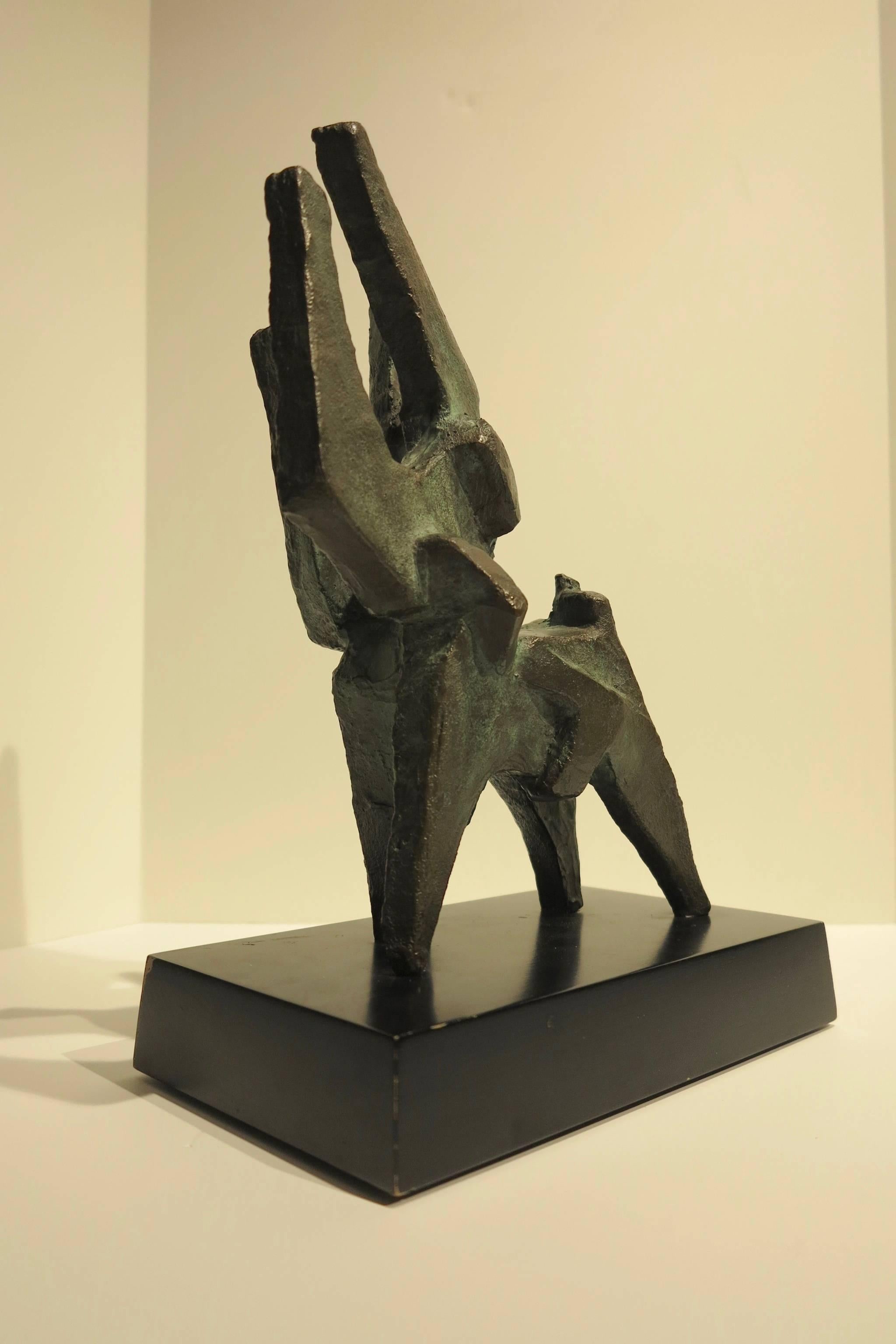 Stunning c. 1960 abstract expressionist sculpture by American artist, Vincent Cavallaro (1912-1985). Cast bronze on rotating beveled wood base.  Base measures 6 x 10.25 inches. Bronze measures 12.5 inches tall, 14.5 inches including base. Excellent