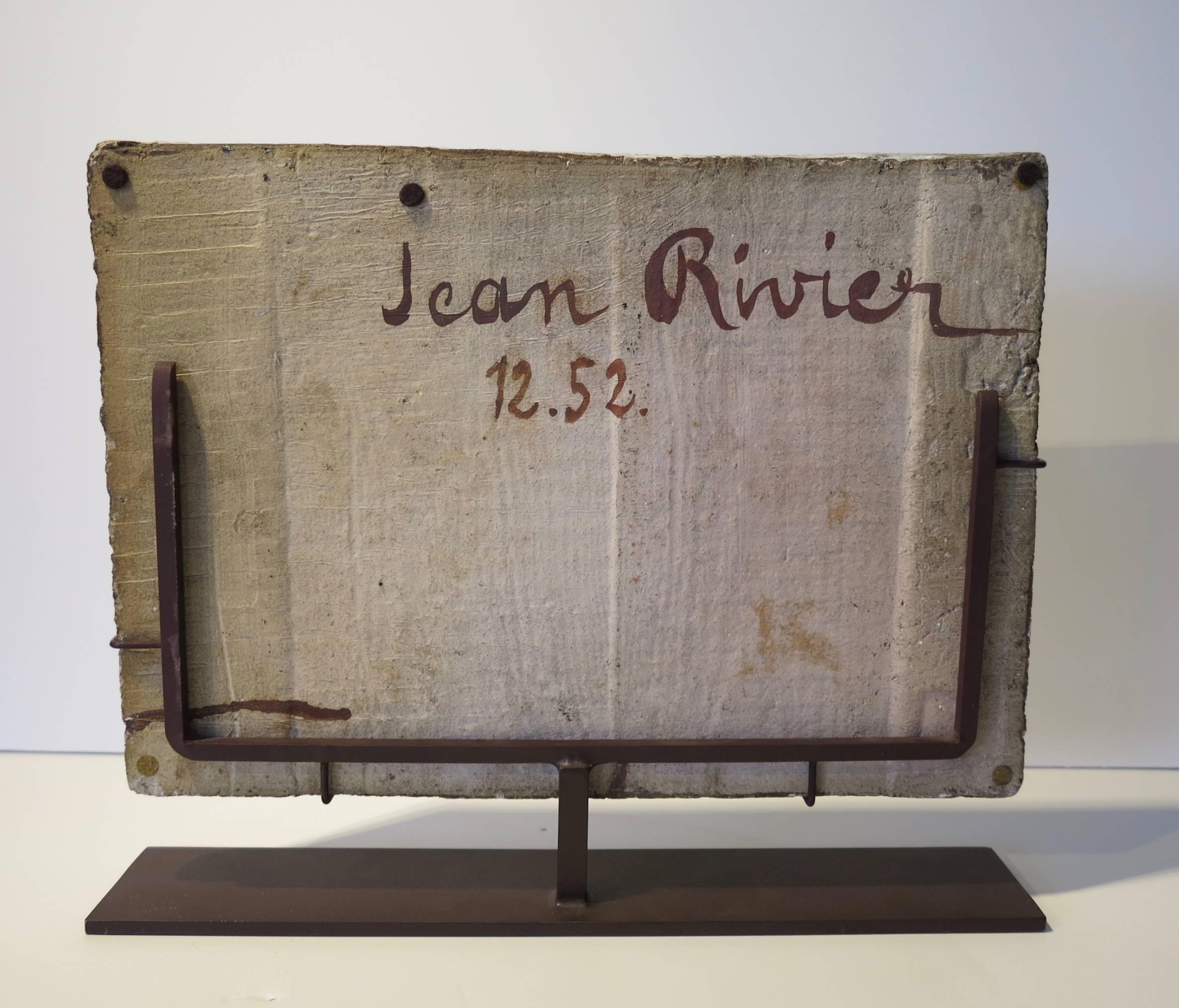 JEAN RIVIER (b. 1915). Plaque with abstract design, France, 1952; Glazed stoneware, painted metal stand; Signed and dated; 13″ x 16″ x 3″, plaque only: 11″ x 15 1/2″ x 1″. Custom painted iron stand by American Primitives, NYC. 