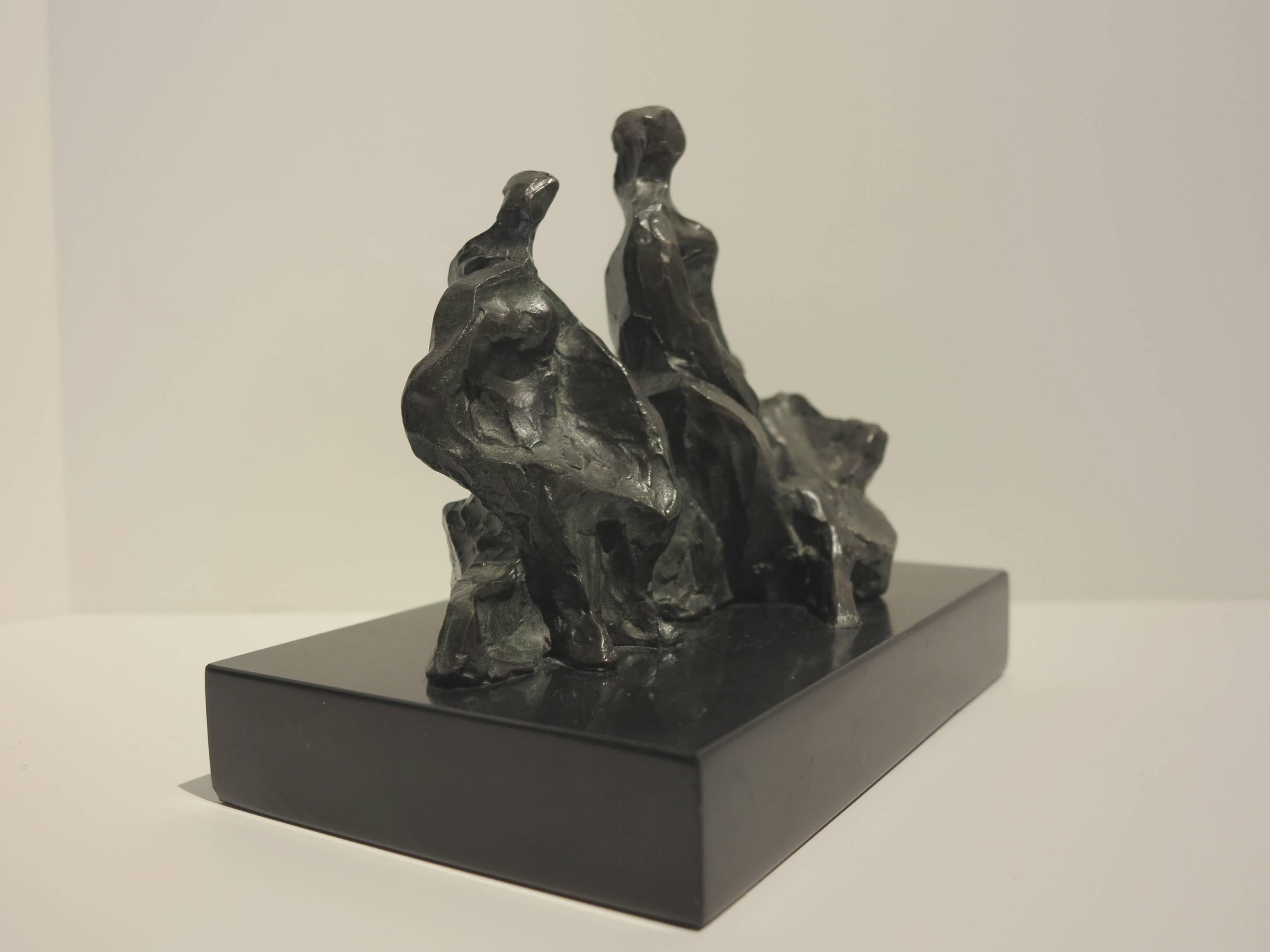 Elegant abstract figural study by American artist, Irving Marantz (1912-1972).  Three Figures in Repose, c.1950s. Bronze cast on onyx stone base. Cast measurement: length: 7 inches; height: 5.25 inches; depth: 4 inches. Base measures 5 x 8 x 1.25