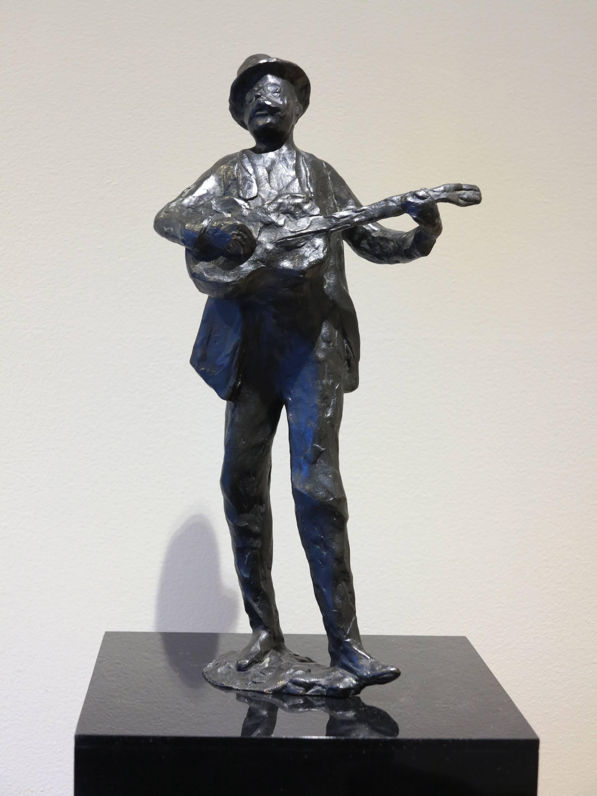 Harry Jackson (1924-2011). Man with Guitar, 1961. Unique bronze cast measures 16 inches tall. Excellent condition with original black patina. Signed, dated and numbered 1/A on base, indicating that it is an Artist's Proof with only one casting made.