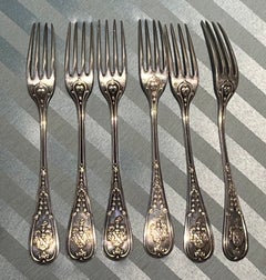Six Puiforcat sterling silver forks, with coats of arms, France, c. 1890