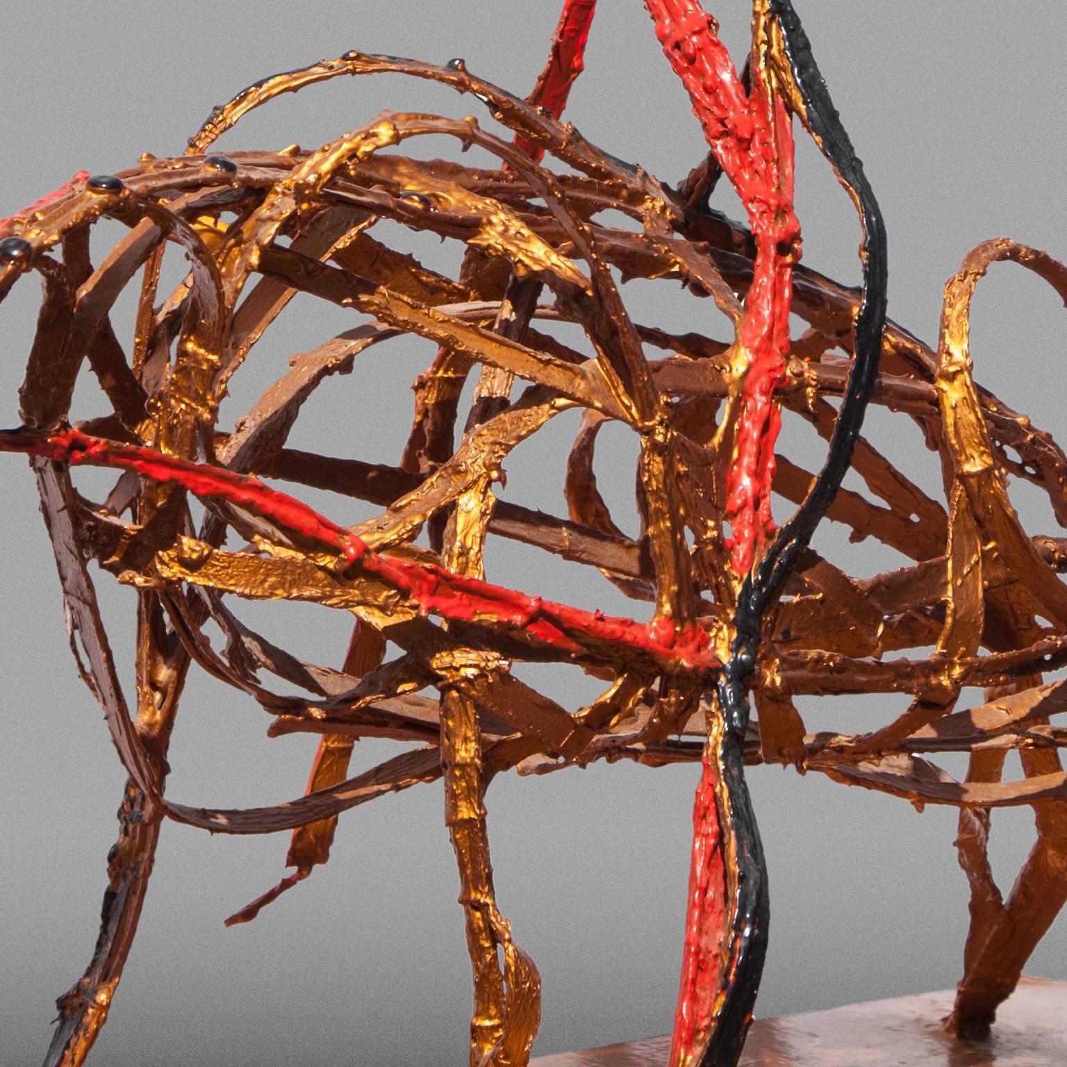 Angelo Canevari’s “Picador” is a 37.5 x 16 inch mix media sculpture. It is made of metal, resin, automotive paint, and cardboard. It represents the lancer and a bull of the famous Spanish bullfighting also known as Corrida. However Canevari stays