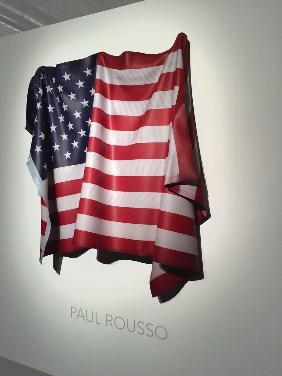 The American flag, a powerful symbol of patriotism, pride, war, freedom of speech and so much more has long attracted many of history's greatest artists - their depictions a reflection of the times in which they lived.  In Paul Rousso's