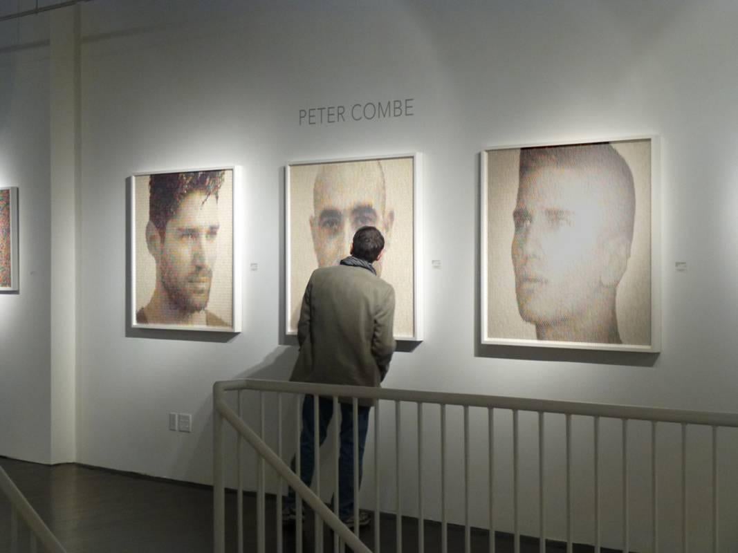 San Francisco-based visual artist Peter Combe creates three-dimensional artworks using household paint swatches as his prime material, usually hand-punched into small disks. He then fits these disks into bevel-cut grooves on a specially prepared