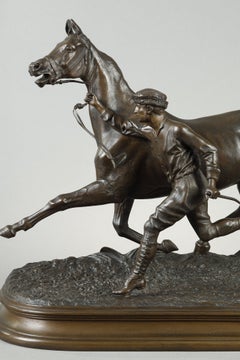 Horse training with its stable lad