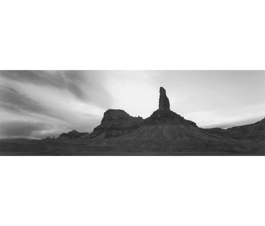 David H. Gibson Landscape Photograph - Bottleneck Peak and Evening Cloud Sweeps, San Rafael Swell, Utah