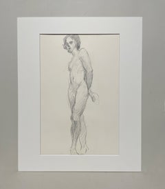Une étude de figure saisissante, réalisée dans un studio de style « post-war modern » des années 1970, représentant un jeune modèle nu masculin