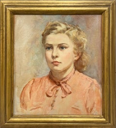 A Striking 1950s Mid-Century Modern Portrait of a Young Woman in a Pink Blouse