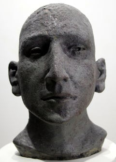 Dark Grey Ceramic Head with Deep-Set Gaze, Textured Glazed Figurative Sculpture