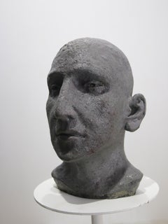 Dark Grey Ceramic Head with Deep-Set Gaze, Textured Glazed Figurative Sculpture