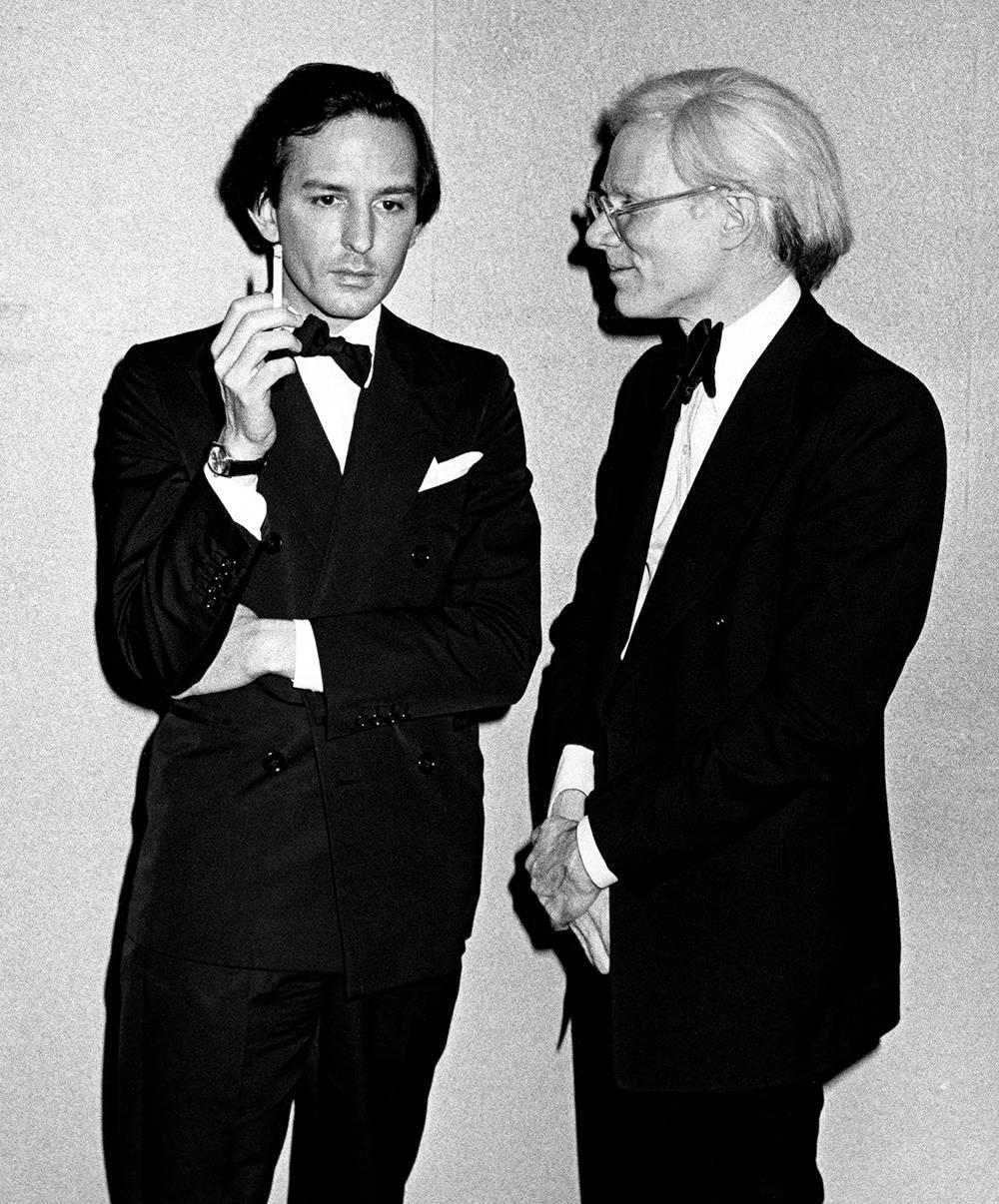 Ron Galella Black and White Photograph - Andy Warhol & Fred Hughes, New York, 1975