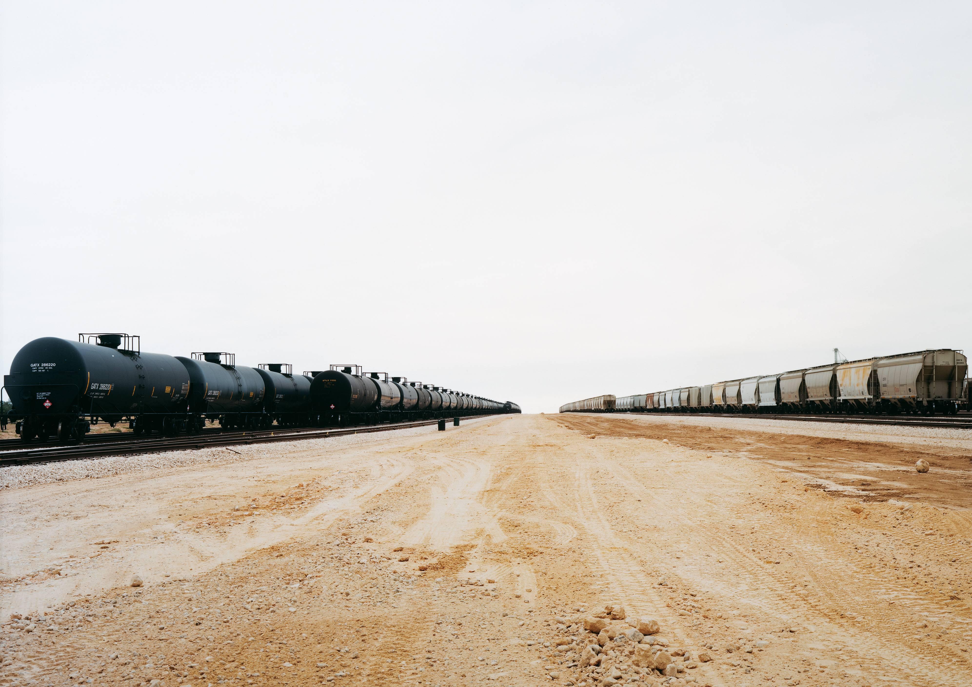 Victoria Sambunaris Landscape Photograph - Untitled (Parallel Cars) near Cotulla, Texas