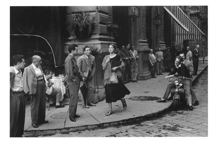 Ruth Orkin Black and White Photograph - American Girl in Italy, 1951, Florence, Piazza Repubblica