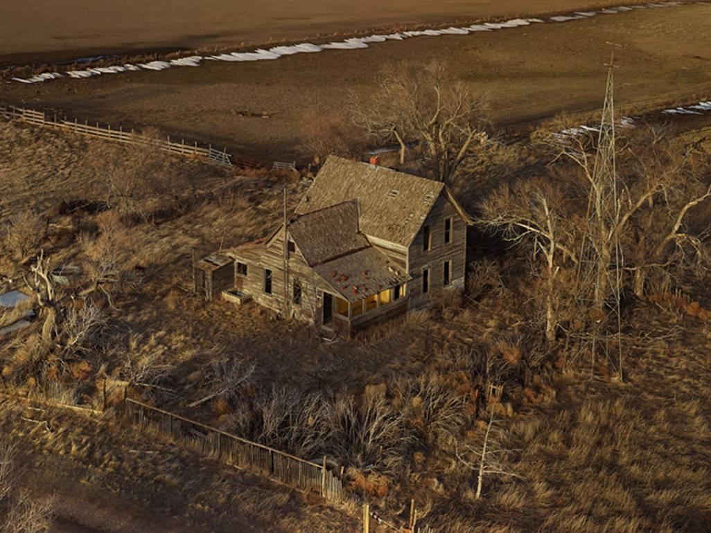 Andrew Moore Landscape Photograph - The Yellow Porch, Sheridan County, Nebraska, from the series Dirt Meridian