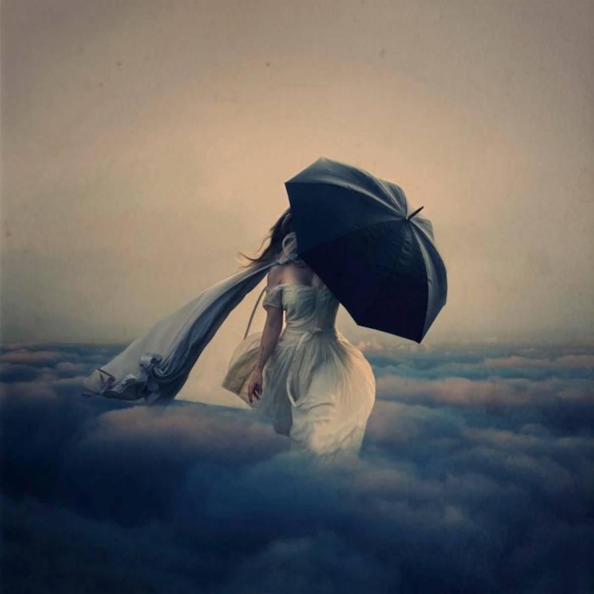 Brooke Shaden Figurative Photograph - The Storm Above the Clouds