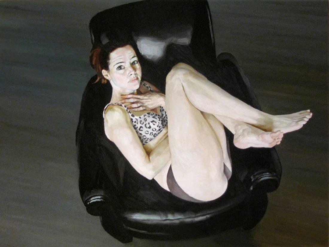 Stephen Wright Figurative Painting - JEN 6, hyper-realism, women curled in chair, black, leopard print, crossed arms