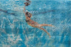 BACK TO THE SURFACE, woman swimming underwater, photo-realism, blue, light 