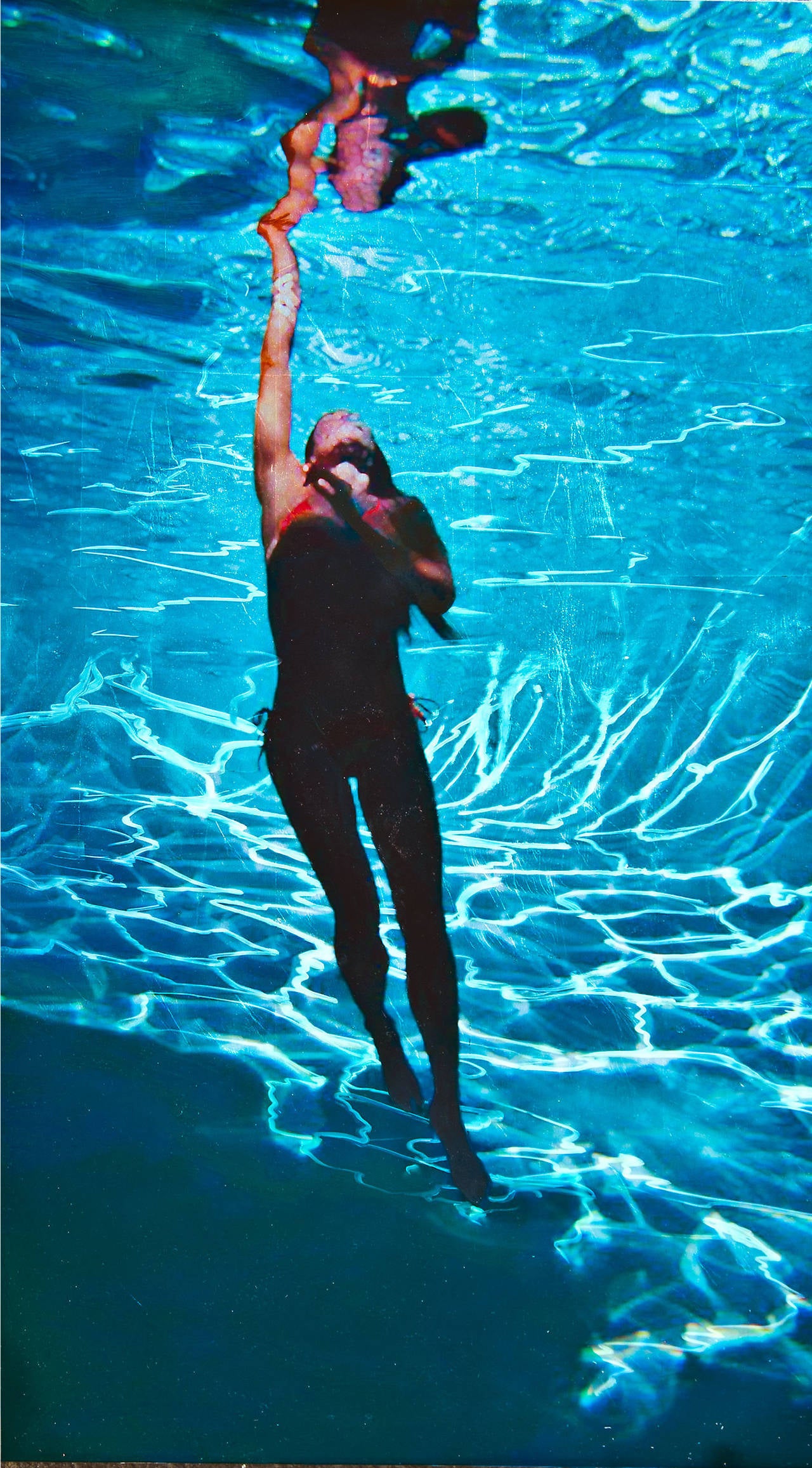 Eric Zener Color Photograph - Reaching Through the Darkness