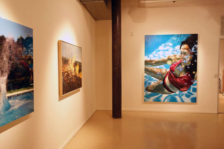 UNBOUND, women underwater, red bikini, blue water, bubbles, light in water - Painting by Eric Zener