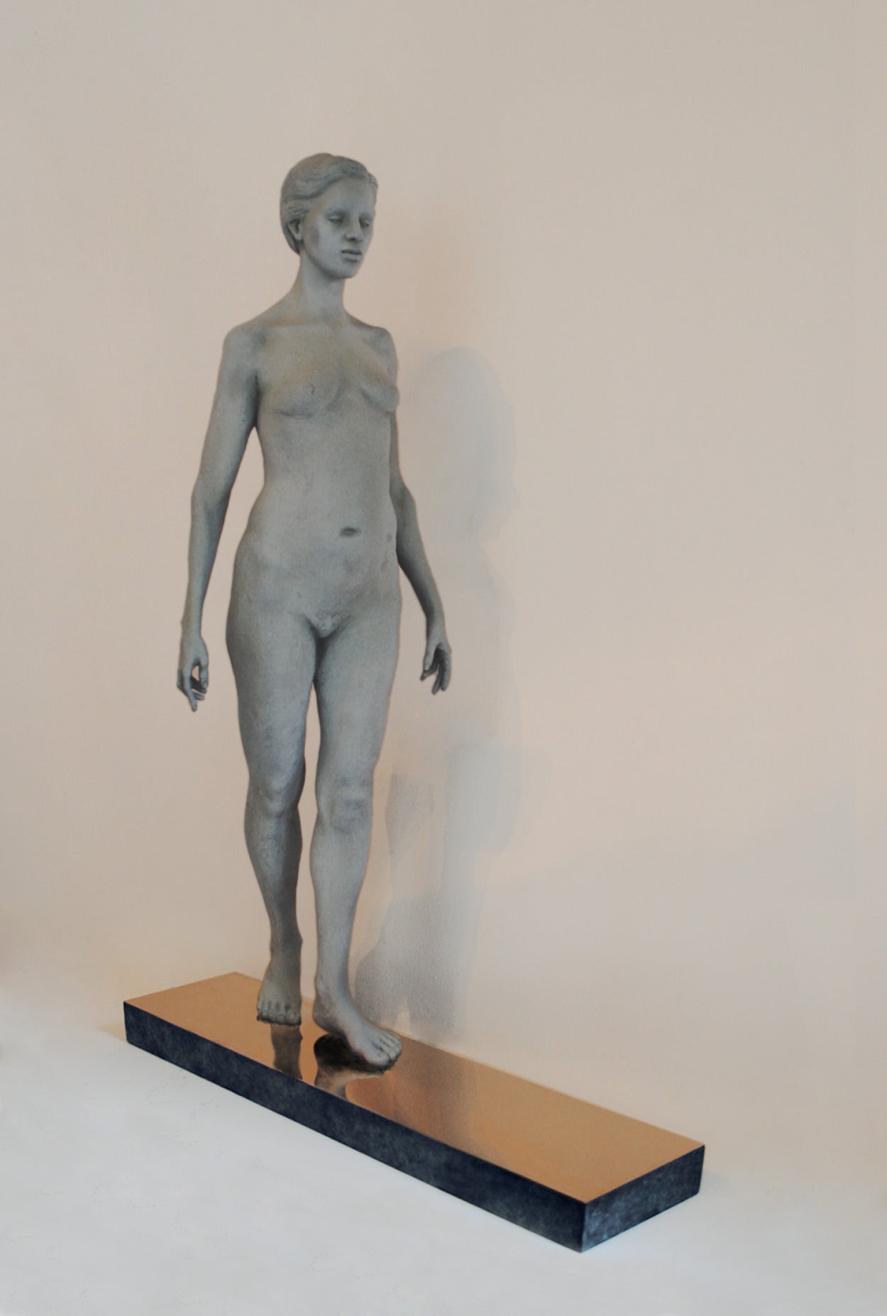 Don Gale Figurative Sculpture - SHE'S WALKING, SCULPTURE STANDING ON PLATFORM, NUDE SCULPTURE, NUDE WOMAN 