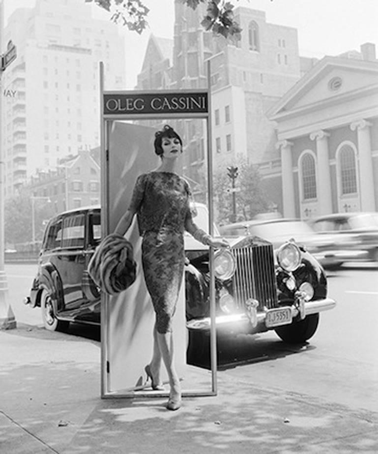 Ann St. Marie, Oleg Cassini, Park Avenue at 63rd Street, 1958 - Photograph by William Helburn