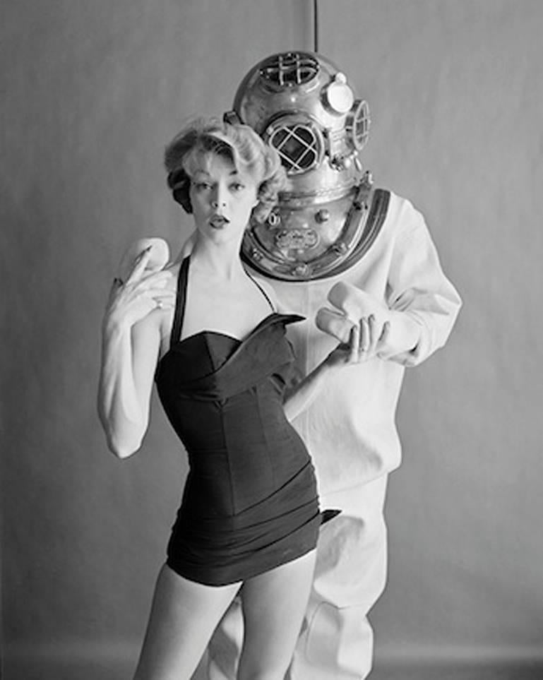 Jean Patchett and Hard Hat Diver, Cole of California, 1954 - Photograph by William Helburn