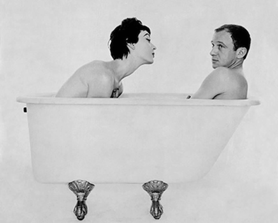 Bill and Dovima in the tub, during a shoot for Corday - Photograph by William Helburn