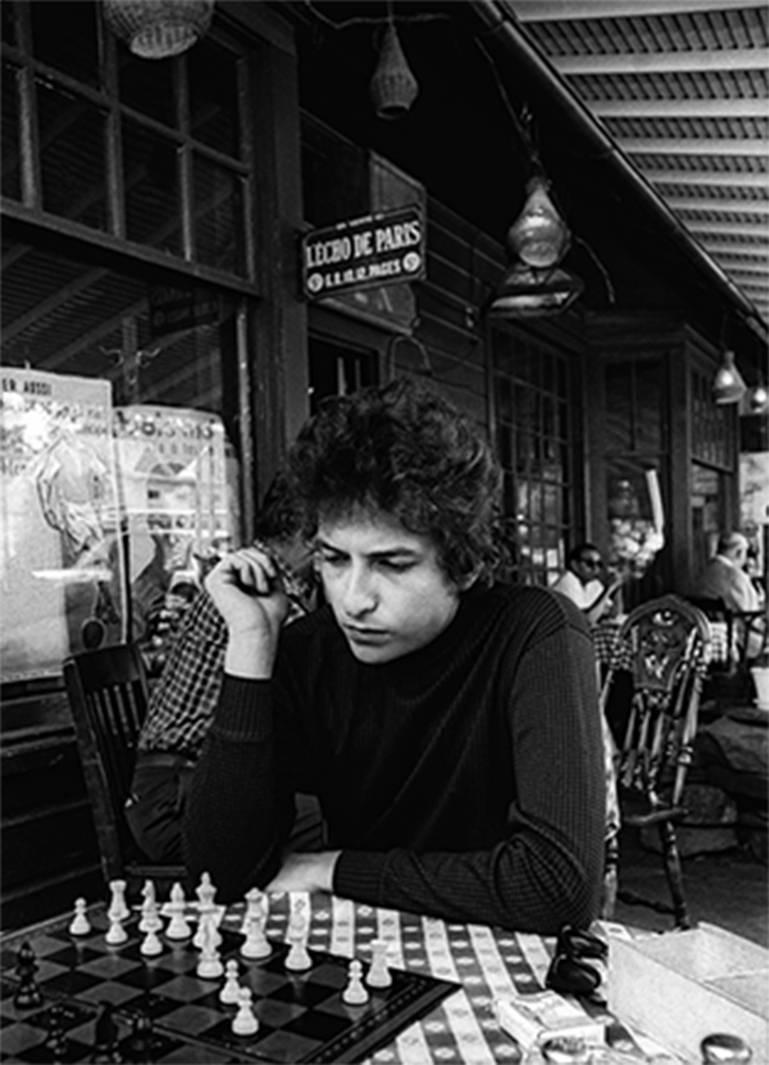 Daniel Kramer Portrait Photograph - Bob Dylan Playing Chess, Woodstock, New York