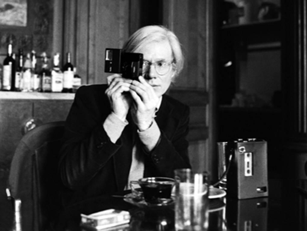 Harry Benson Black and White Photograph - Andy Warhol at The Factory, New York, 1977 