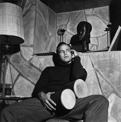 Vintage Marlon Brando with bongo drums at his Beverly Hills home