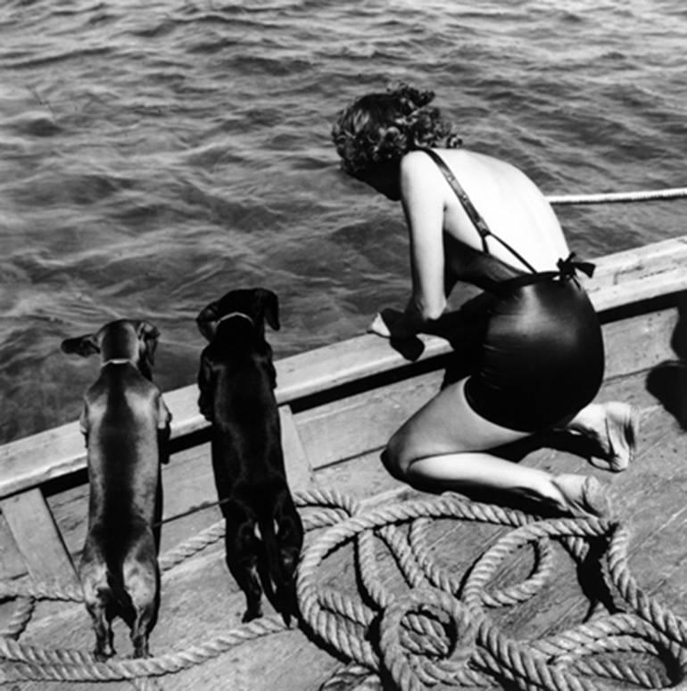 Toni Frissell Black and White Photograph - Woman with Two Dachshunds
