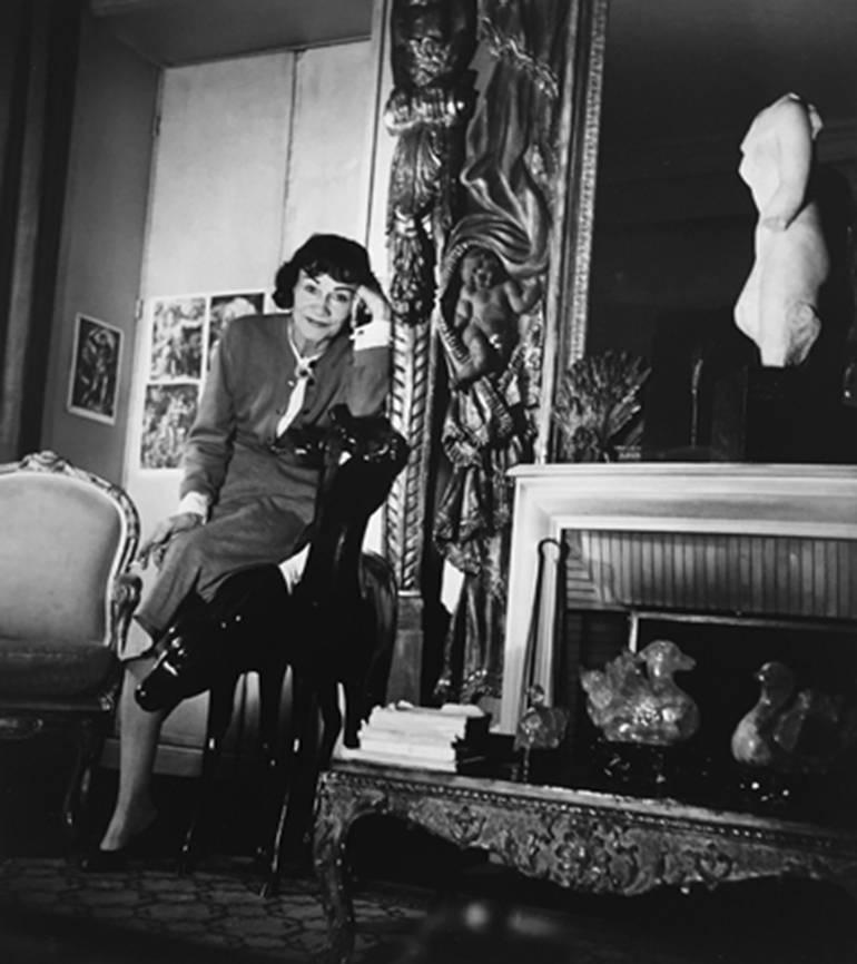 Coco Chanel Leaning on Chair in her Apartment, Paris