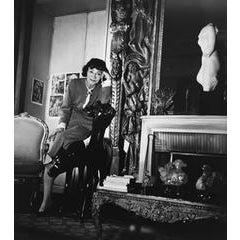 Coco Chanel Leaning on Chair in her Apartment, Paris 8
